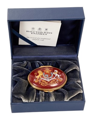 Lot 176 - H.M.Queen Elizabeth II, 2012 Royal Household Christmas present Halcyon Days oval enamel box decorated with Royal Arms with prevention inscription to inside in original fitted box with crowned ER II...