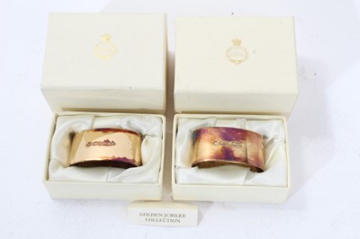 Lot 177 - The Golden Jubilee 2002, Pair Royal collection silver gilt napkin rings in boxes