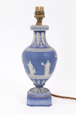 Lot 299 - 19th century Jasper ware vase, probably Wedgwood, decorated in relief with classical figures, on a chamfered square base, converted to a lamp, 28cm high including mount