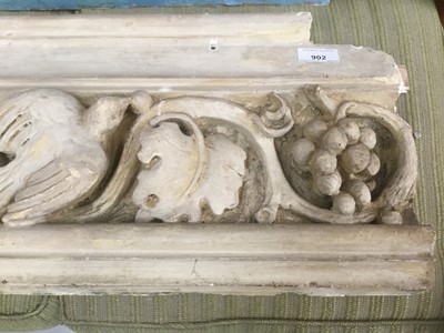 Lot 902 - Late 19th century Arts and Crafts architectural frieze, finely modelled with scrolling vines and birds, 148cm long