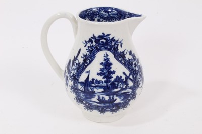 Lot 3 - A Worcester blue and white sparrow beak jug, circa 1780, decorated with European landscapes scenes in shaped panels, 9cm high