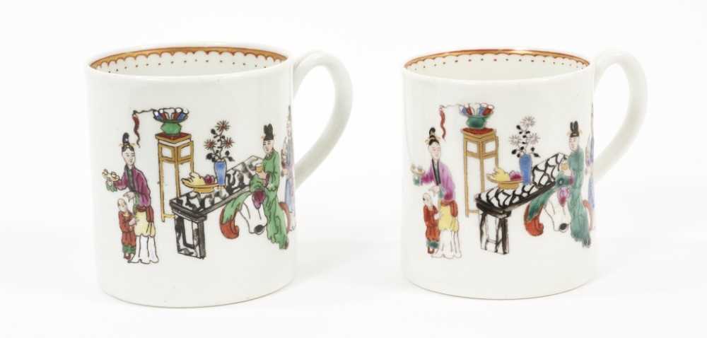 Lot 10 - A pair of Worcester coffee cans, circa 1770, polychrome painted with Chinese figures, 6cm and 6.25cm high