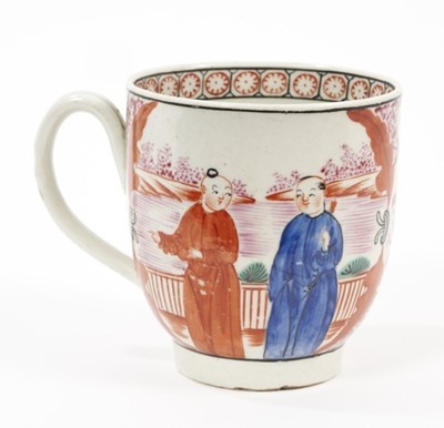 Lot 11 - A Worcester coffee cup, circa 1775, painted in bright colours with a version of the 'Mandarin' pattern with leaf-edged panels containing Chinese figures, 6.5cm high