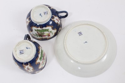 Lot 18 - Worcester trio, circa 1770, polychrome painted with tropical birds on a scale blue ground, W marks to bases, the saucer measuring 13cm diameter