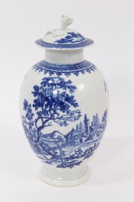 Lot 24 - A Worcester blue and white tea canister and cover, circa 1775, decorated with European landscape scenes, 15.5cm high