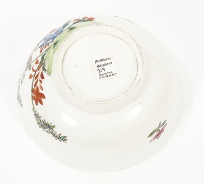 Lot 30 - An English porcelain bowl attributed to Vauxhall, circa 1755, polychrome painted in the Chinese style with flowers issuing from rockwork, 15cm diameter