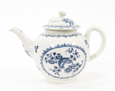 Lot 34 - A Worcester blue and white teapot, circa 1780, decorated with the Fruit and Wreath pattern, crescent mark to base, 13cm high