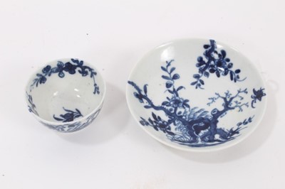 Lot 36 - A Worcester miniature blue and white teabowl and saucer, circa 1760, painted with the Prunus Root pattern, painter's marks, the saucer measuring 8.25cm diameter