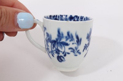Lot 41 - A Caughley miniature blue and white tea bowl and saucer, circa 1780, decorated in the Island pattern, together with a miniature blue and white cup painted with flowers, probably Worcester (3)