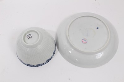Lot 53 - Worcester blue and white moulded tea wares, circa 1780, including a tea bowl and saucer with floral moulding, and a cup, tea bowl and saucer (5)
