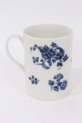 Lot 54 - A Caughley blue and white mug, printed with floral sprays, C mark to base, 8.5cm high