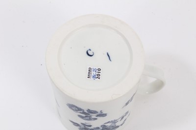 Lot 54 - A Caughley blue and white mug, printed with floral sprays, C mark to base, 8.5cm high