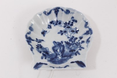 Lot 56 - A Worcester blue and white pickle dish, circa 1758, decorated with the Two Peony Rock Bird pattern, painter's mark to base, 7.5cm high