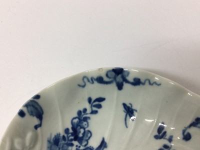 Lot 57 - A Worcester blue and white leaf moulded dish, circa 1758, painted with the Two Peony Rock Bird pattern, workman's mark