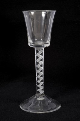 Lot 72 - Georgian single series air twist glass, circa 1750, with bucket bowl ,spiral gauze stem, and high conical foot, 16cm high