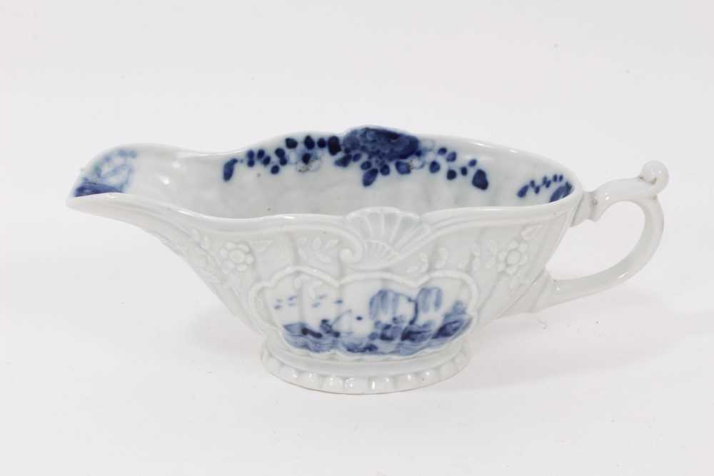 Lot 86 - A Samson blue and white moulded sauceboat, in the style of Worcester, 18.5cm from spout to handle