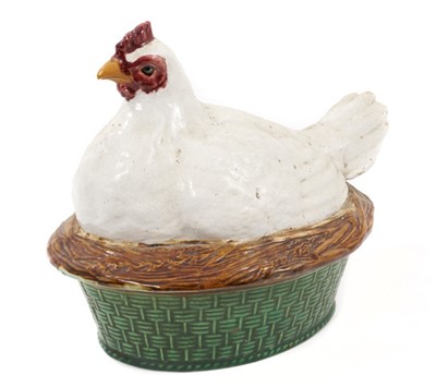 Lot 94 - A Minton majolica hen crock, mid 19th century, with white feathers, stamped marks, 20cm high