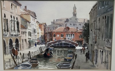 Lot 353 - Follower of Edward Seago, watercolour - Venetian Canal, signed with initials W.O.H., 31cm x 46cm, in glazed gilt frame