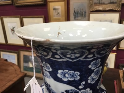 Lot 106 - Pair of 19th century Chinese blue and white Gu vases, one significantly damaged