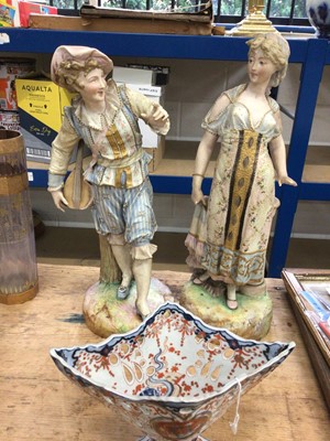 Lot 37 - Pair of late 19th century continental bisque porcelain figures.