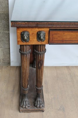 Lot 1303 - Fine Regency mahogany and ebony line inlaid serving table in the manner of George Oakley, with two frieze drawers between finely cast bronze lion mask mounts on four pairs of reeded legs, each with...