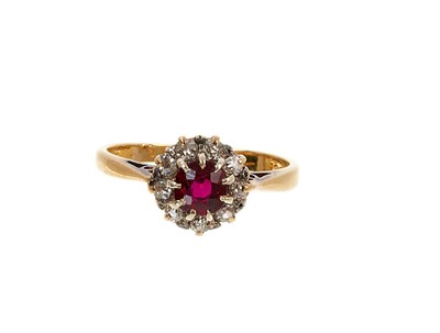 Lot 478 - Ruby and diamond cluster ring