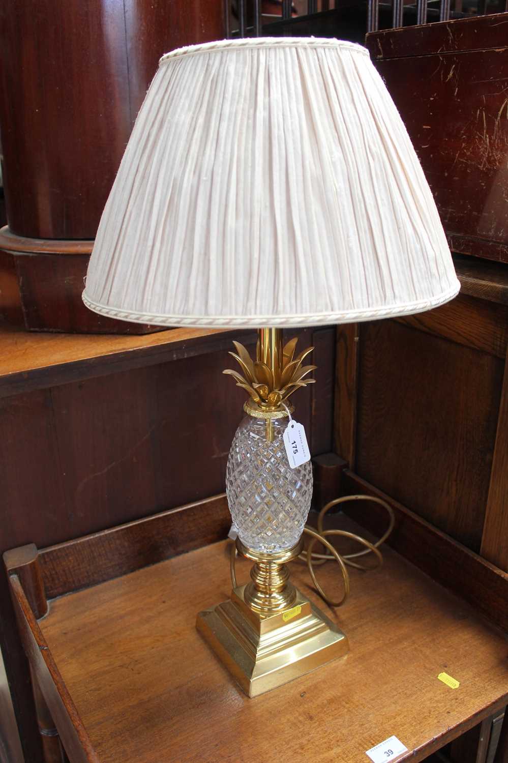 Lot 175 - Good quality cut glass and gilded brass table lamp with 'pineapple' column, with shade