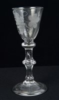 Lot 240 - Georgian Wine glass with vine engraved funnel...