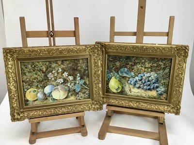 Lot 218 - After Vincent Clare, pair of watercolours, still life fruit on a mossy bank, 21cm x 30.5cm, in glazed gilt frames