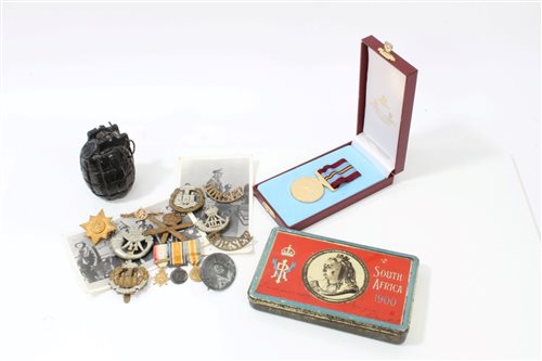 Lot 576 - Boer War chocolate tin, military badges,