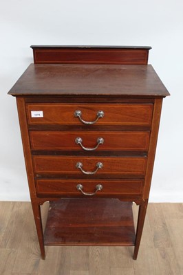 Lot 1075 - Edwardian inlaid mahogany music cabinet with four slides and undertier below