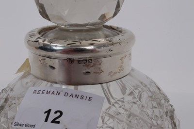 Lot 12 - George V silver mounted cut class scent bottle of globular form, (London 1917), maker JHW & Son, approx 14cm high