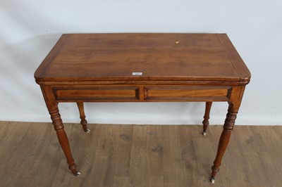 Lot 1084 - Nineteenth century elm tea table with fold over top on turned legs