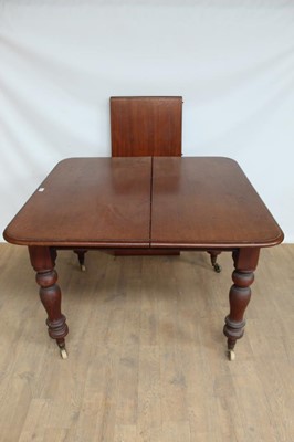 Lot 1092 - Victorian mahogany extending dining table with one extra leaf on turned legs and, opening to 60" x 42"