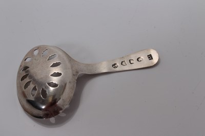 Lot 24 - George III silver caddy/sifter spoon with brite cut engraved decoration, (Birmingham 1821), marker IT, 7.2cm long, (0.2oz)