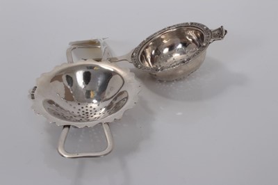 Lot 28 - George VI silver tea strainer, (Birmingham 1943), together with another silver tea strainer (Birmingham 1958), (all at 2.7oz)