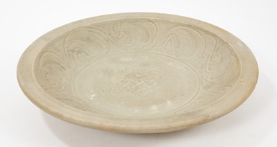 Lot 103 - Chinese celadon dish, Yuan dynasty, from the Java shipwreck, with incised floral decoration, 32cm diameter