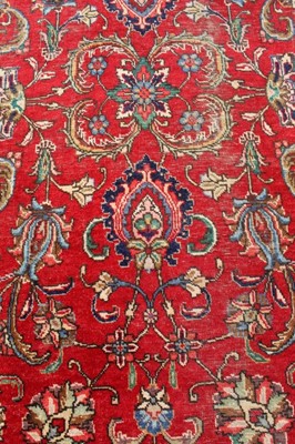 Lot 1492 - A large Heriz style carpet.