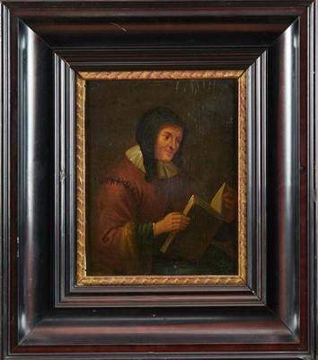 Lot 1204 - Continental School, 17th century, oil on panel, lady reading, inscription verso attributes the work to Cornelius De Vos, 25cm x 19.5cm, in ebonised frame .