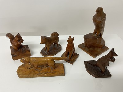 Lot 562 - Group of six folk art carvings of animals.