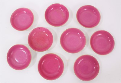 Lot 176 - Nine Chinese pink ground small round dishes