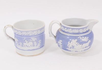 Lot 166 - A New Hall mug, with applied decoration, on a lilac ground, and dated 1819, and a similar jug