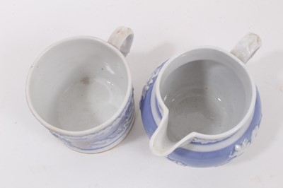 Lot 172 - A New Hall mug, with applied decoration, on a lilac ground, and dated 1819, and a similar jug