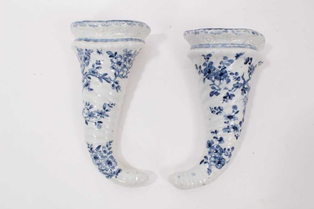 Lot 167 - A pair of Worcester cornucopia shaped wall pockets, painted with the Prunus Root pattern, circa 1755