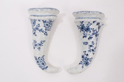Lot 167 - A pair of Worcester cornucopia shaped wall pockets, painted with the Prunus Root pattern, circa 1755