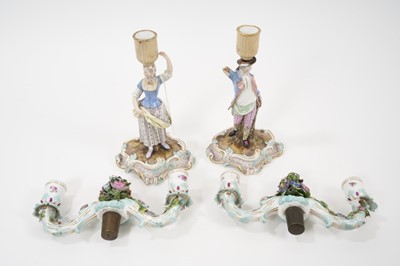 Lot 168 - A pair of Meissen two branch candelabra, circa 1860
