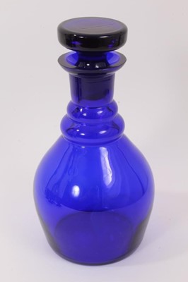 Lot 174 - A ‘Bristol’ blue tinted glass decanter and stopper and five rummers, each on square base