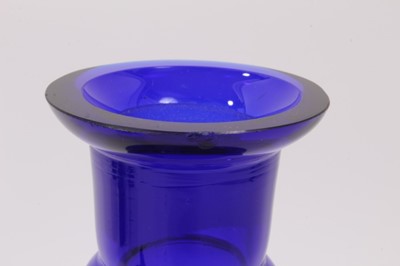 Lot 169 - A ‘Bristol’ blue tinted glass decanter and stopper and five rummers, each on square base