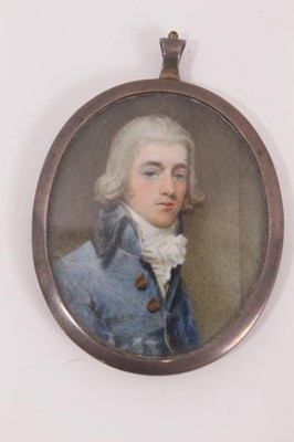 Lot 801 - A portrait miniature of a young man, in silver and enamelled frame