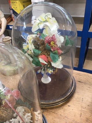 Lot 40 - Two antique glass domes on wooden bases, with fruit and flower displays inside